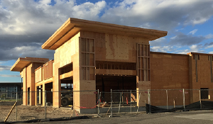 Numerica Pasco branch under construction with wooden walls and roof built out.